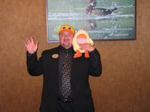 Dale at Homewood Suites with Jim's duck and duck hat